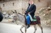man-riding-on-donkey-rafaelwiedenmeier-picsay.jpg