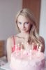 43393228-sexy-blonde-woman-holding-birthday-cake-indoor.jpg