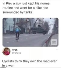 Cyclist own the road.JPG